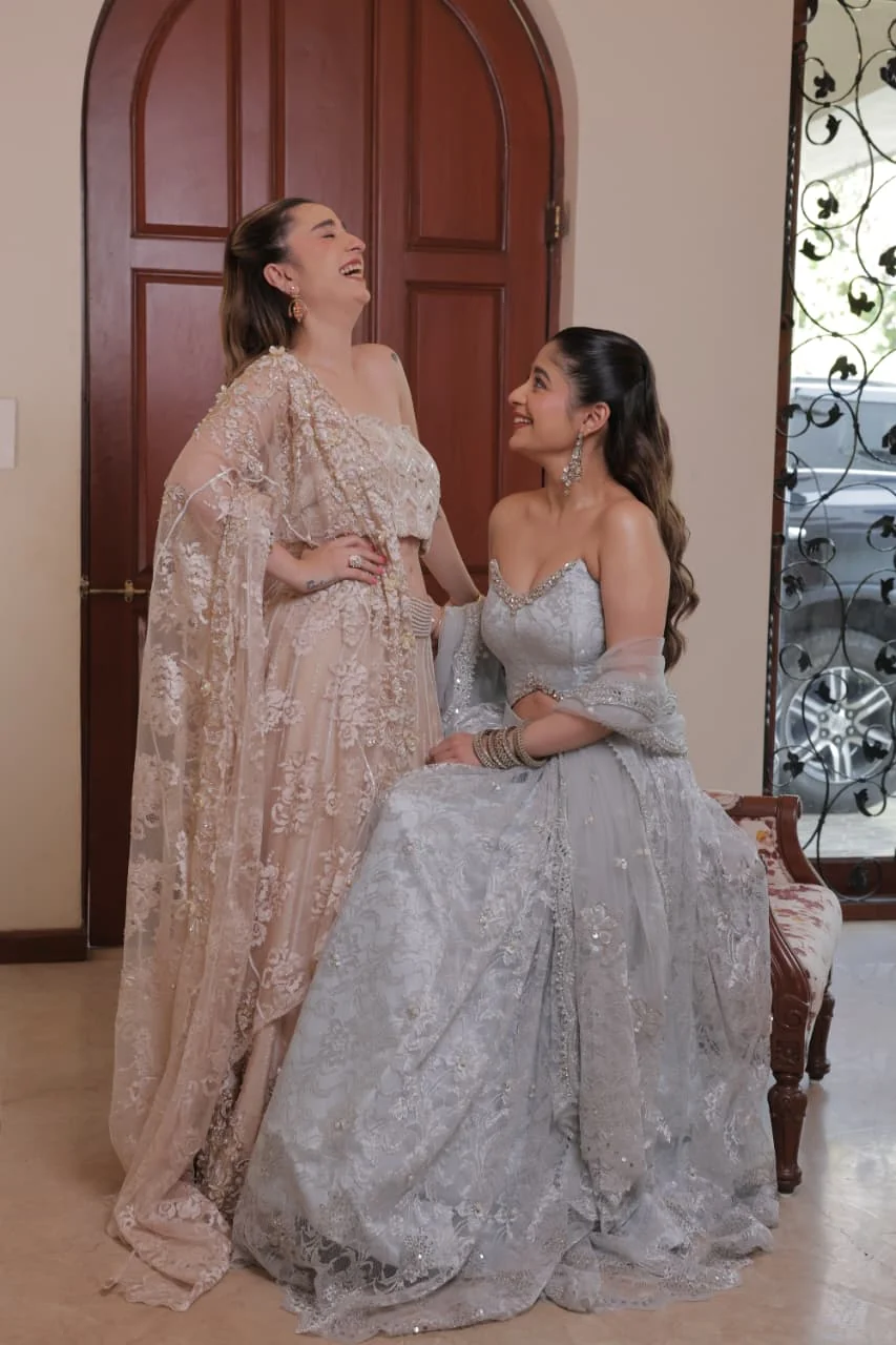 Mother and daughter bridal styling in soft couture gowns